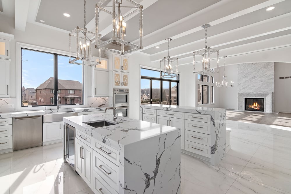 Dual-island kitchen with Dura Supreme Crestwood cabinetry in the Silverton door style with White paint