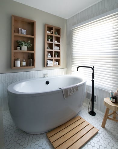 Wet room design - bath integrated into shower area