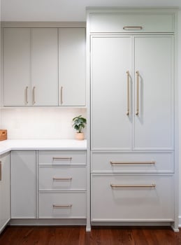 Inspira Cabinetry in the Aspen door style with Accessible Beige finish