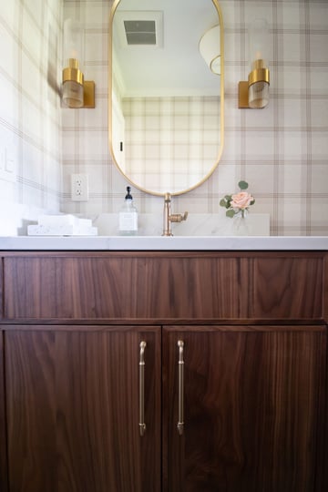 Inspira Cabinetry in Aspen door style in natural walnut