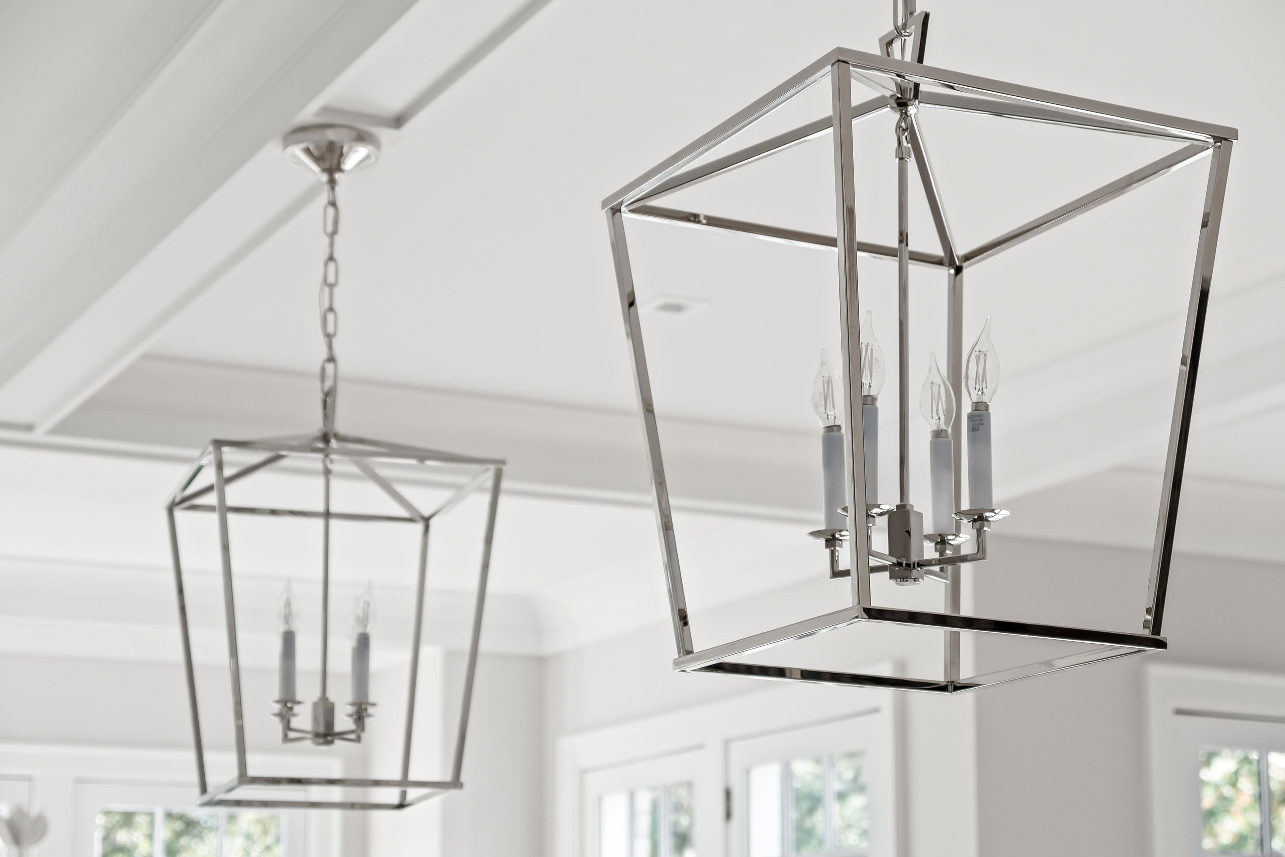 Detail of elegant lighting above the kitchen island.