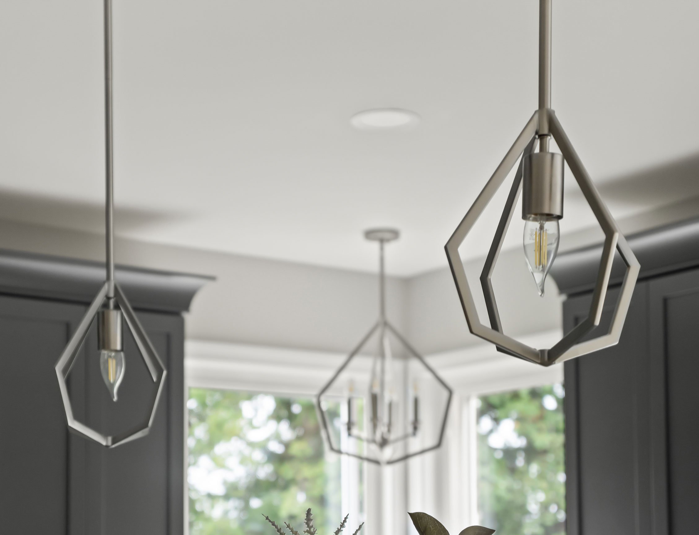 Slim modern pendant lights and recessed lights