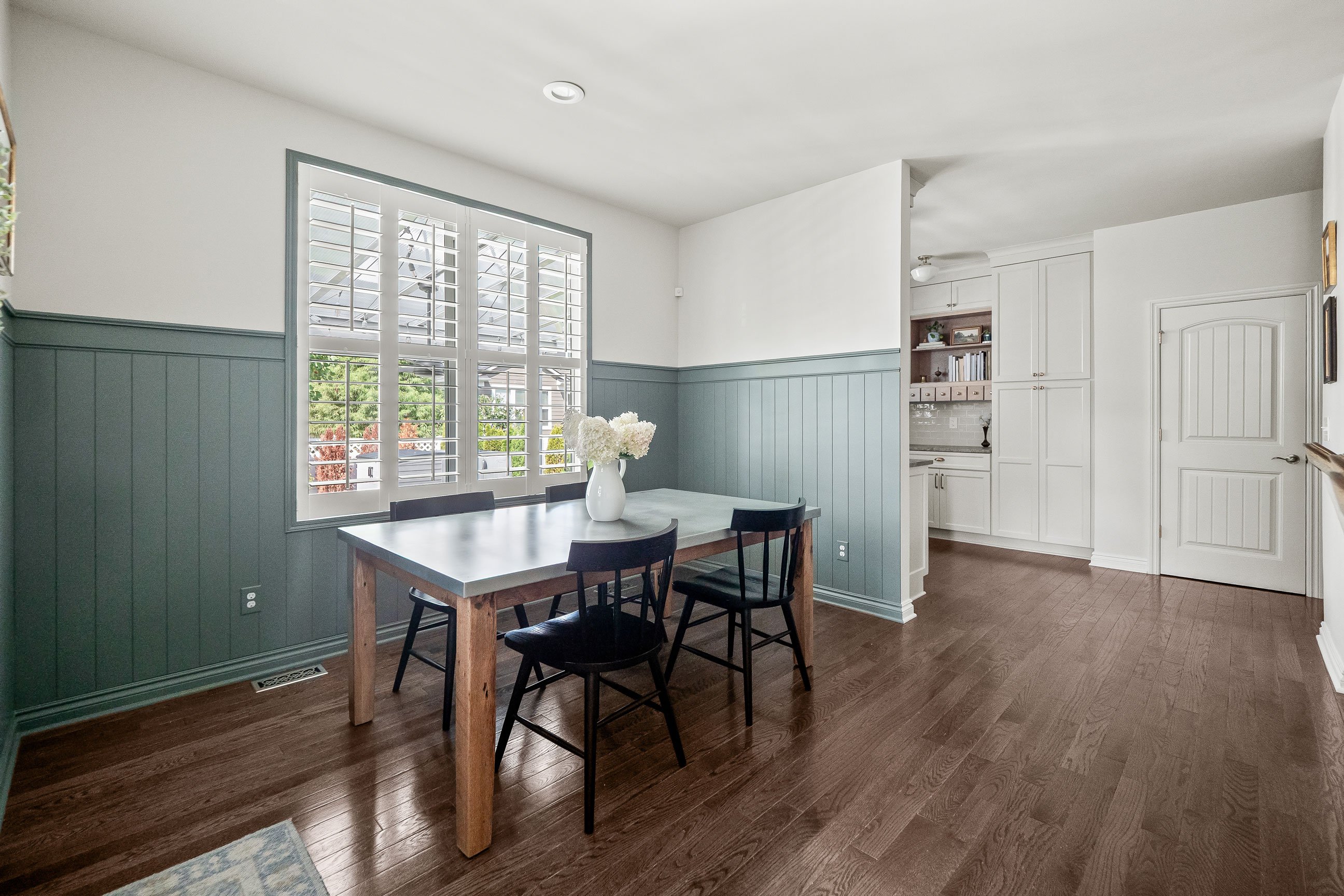 Dining area adjacent to expanded kitchen pantry