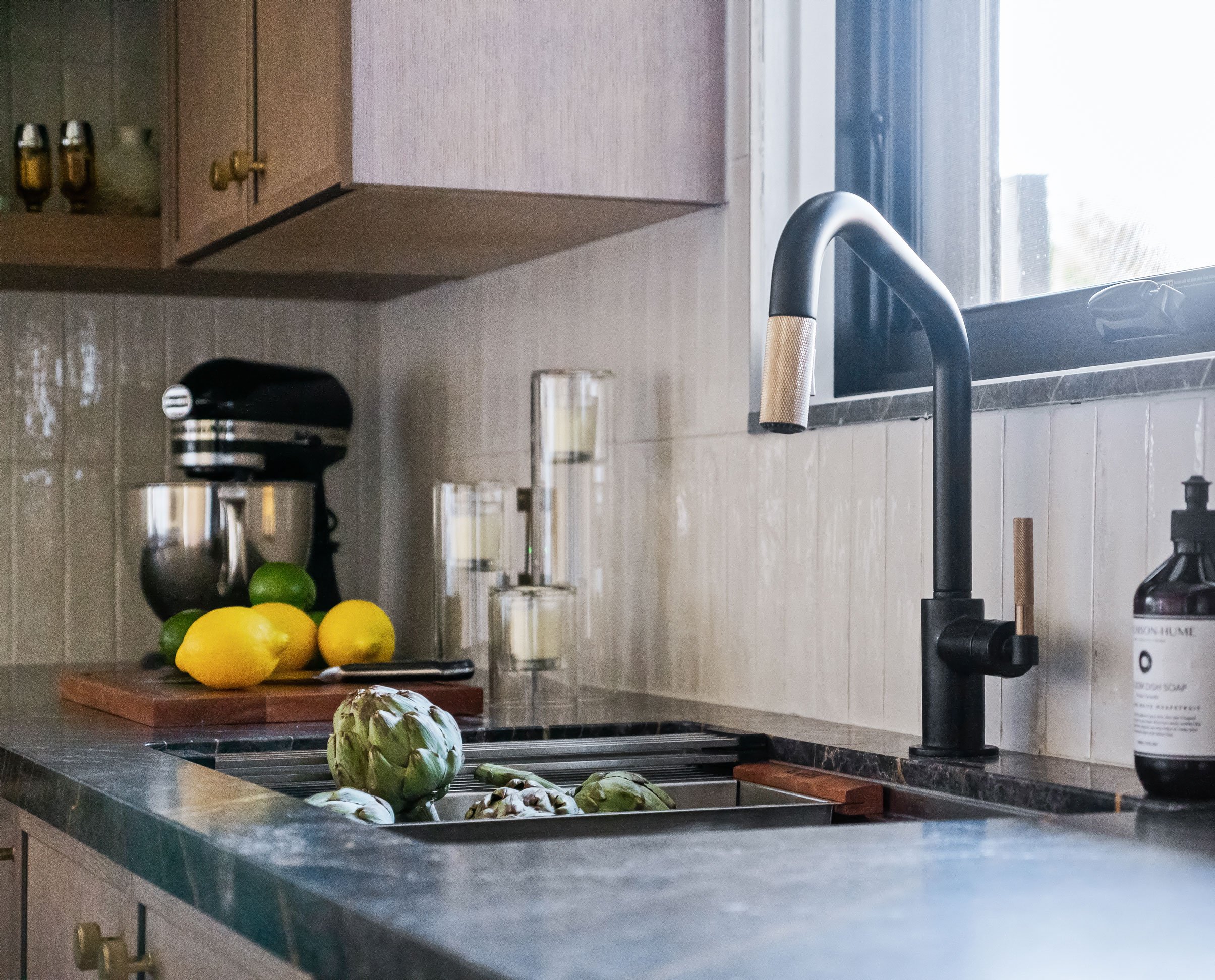 versatile work station sink with artichokes