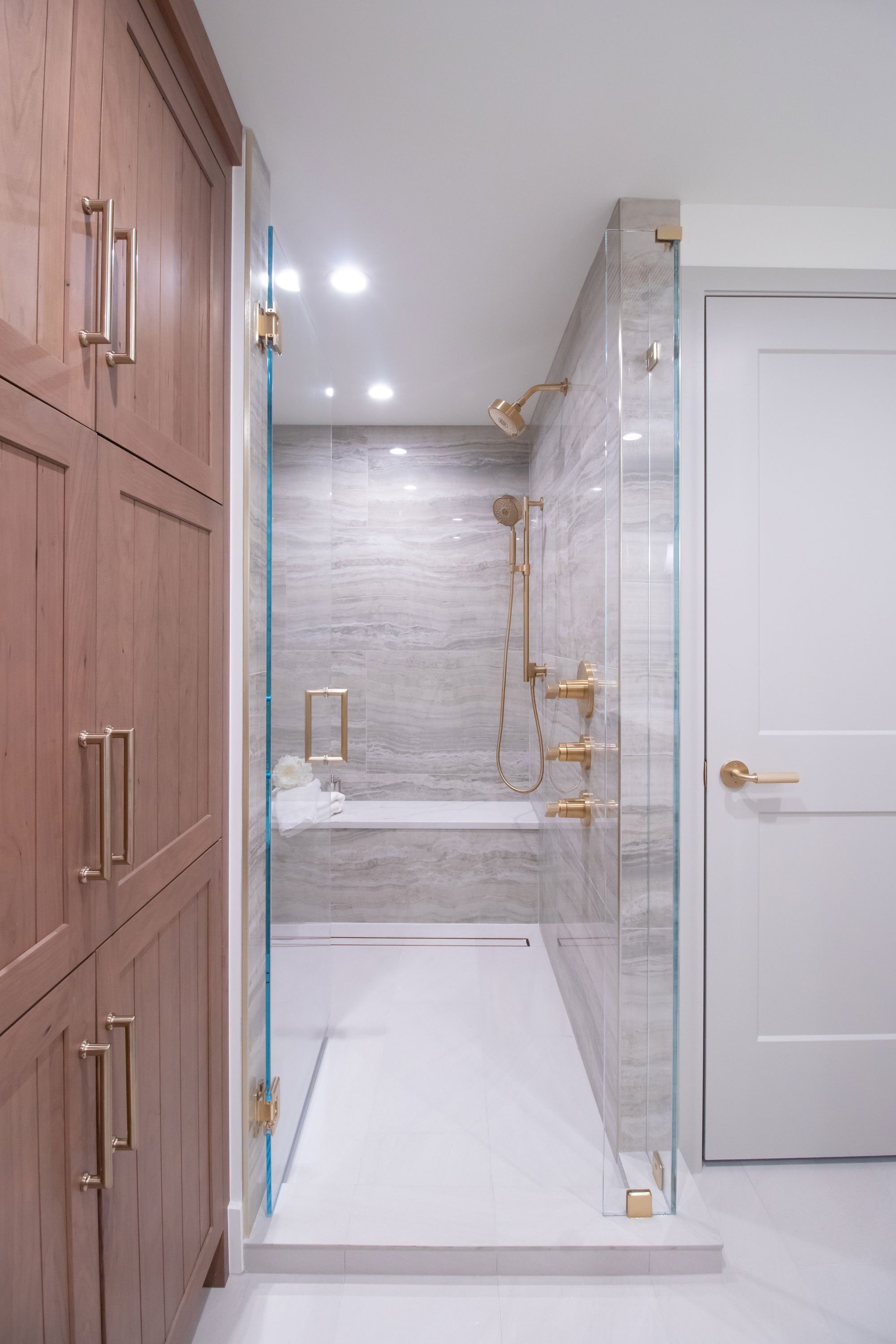 Linen closet and walk-in shower
