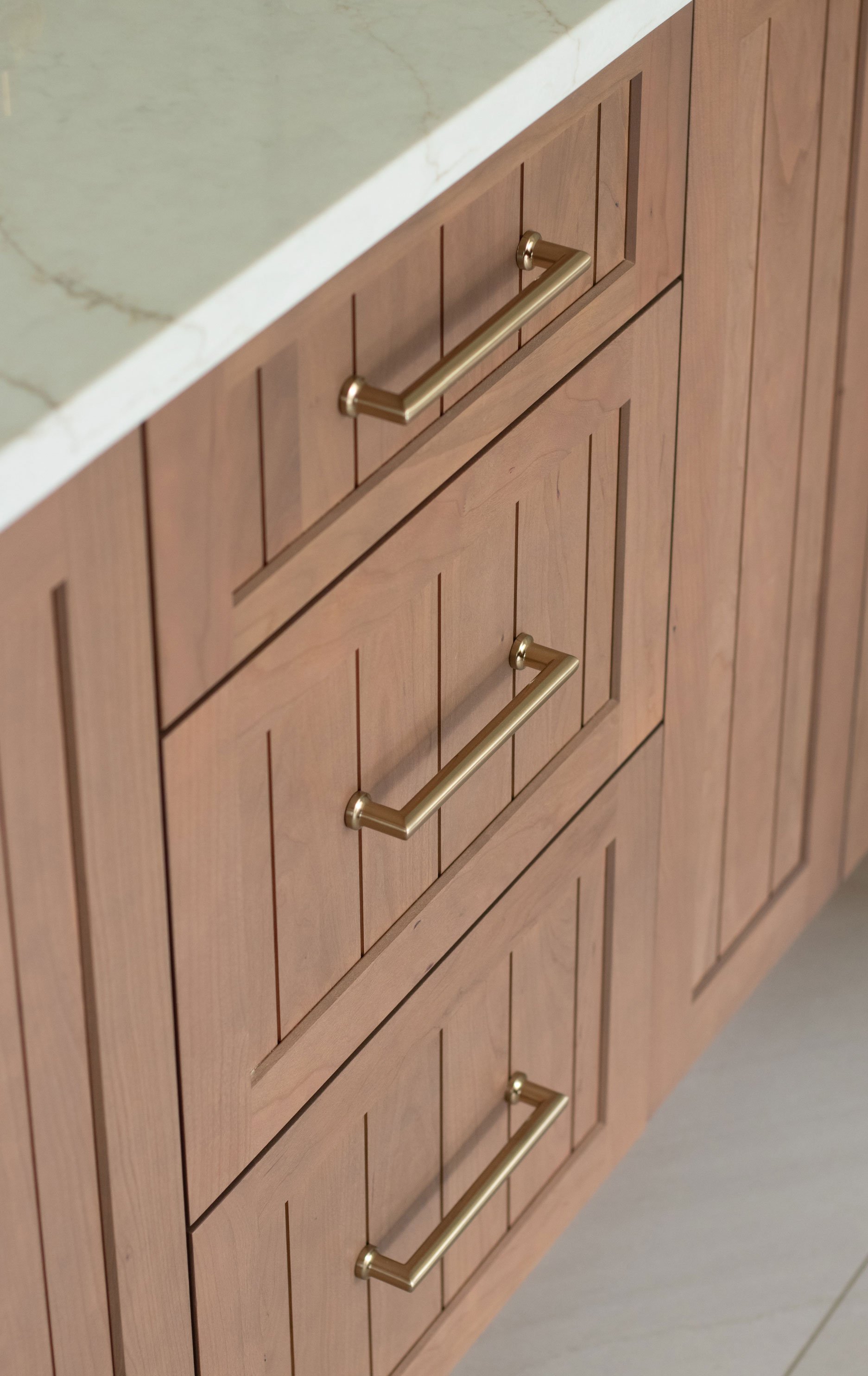 Warm wood cabinetry detail