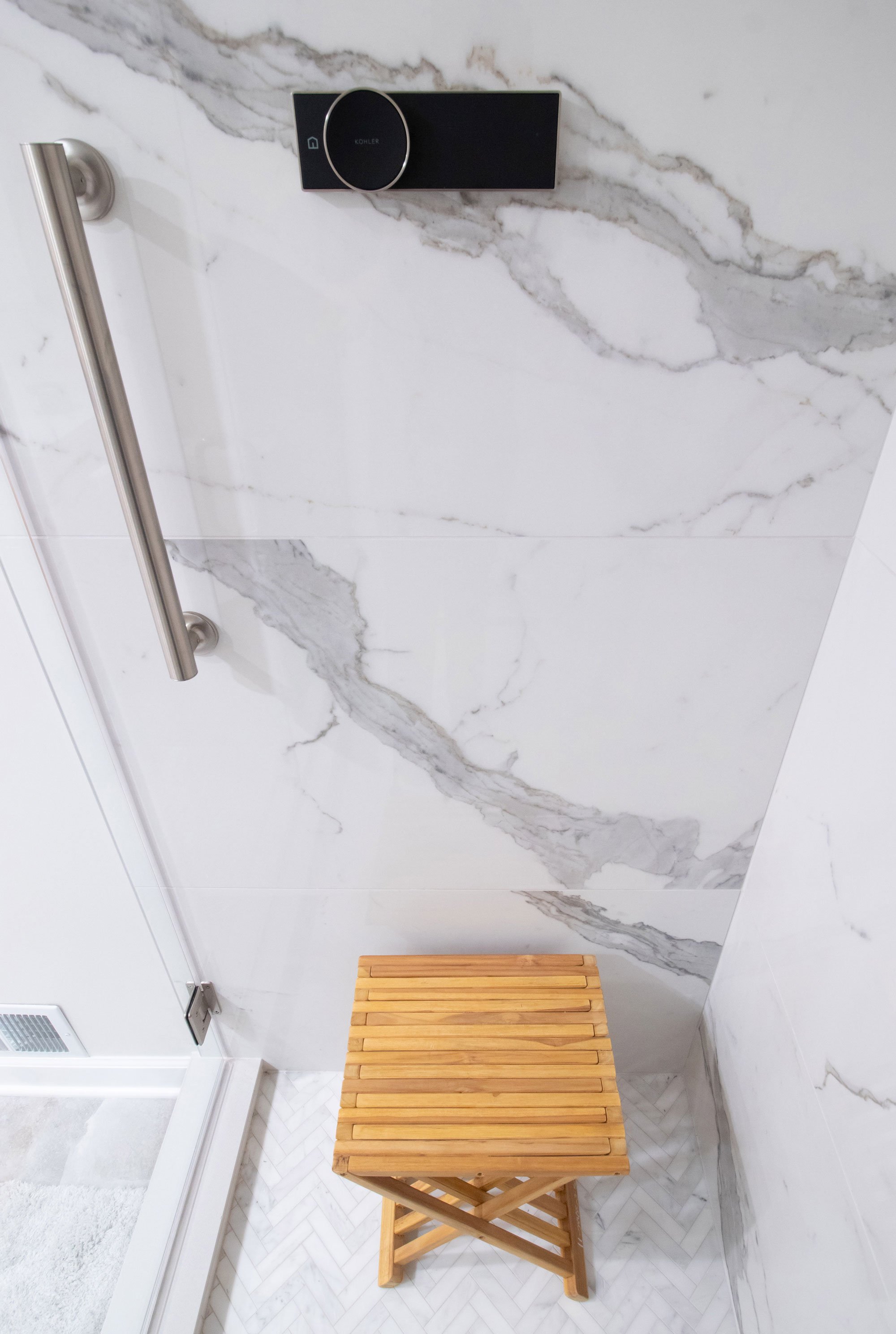 Accessible aging-in-place bath remodel with ADA handrails and Kohler Anthem digital shower system