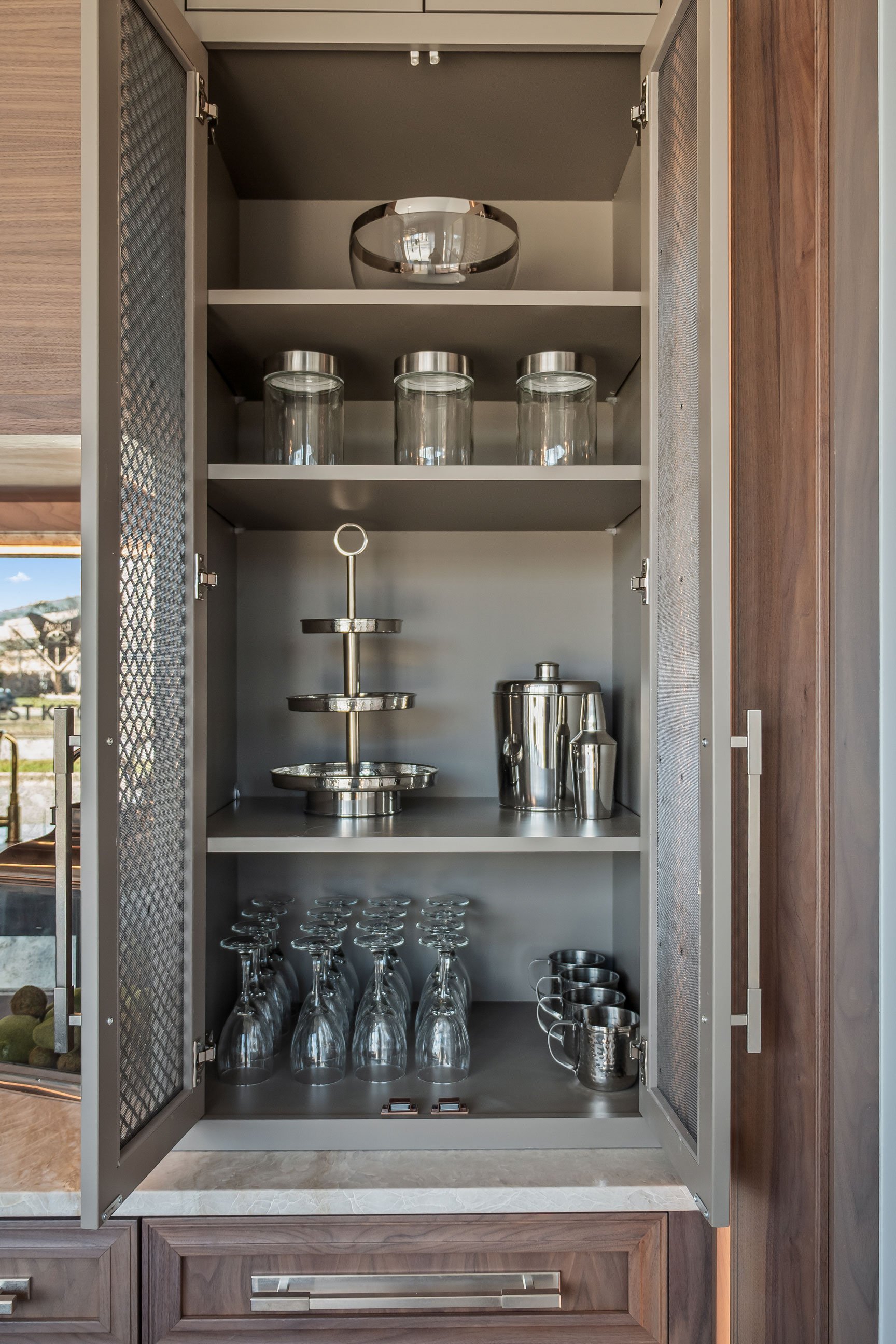 Hidden bar area in tower cabinet