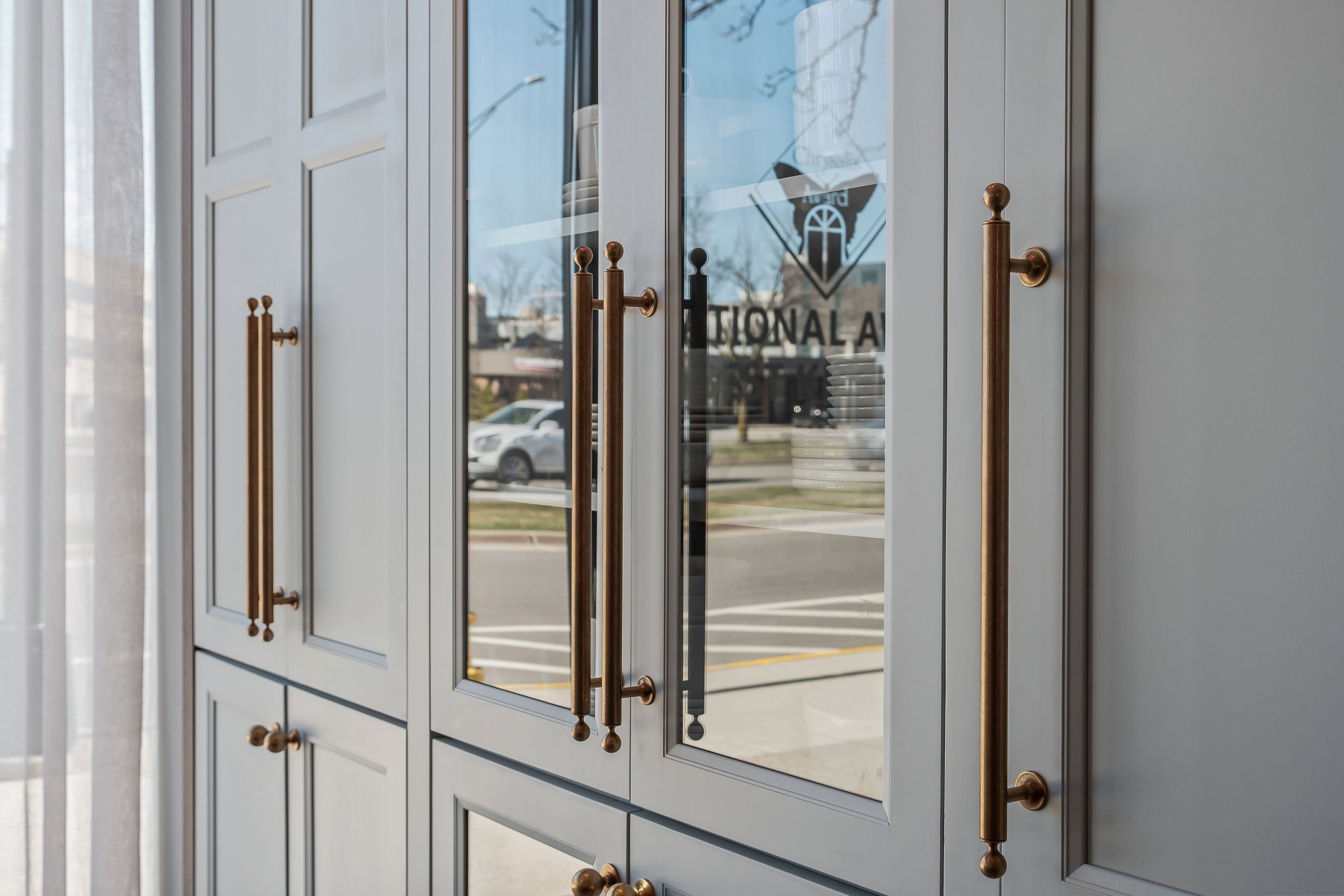 Plate pantry in light blue cabinetry