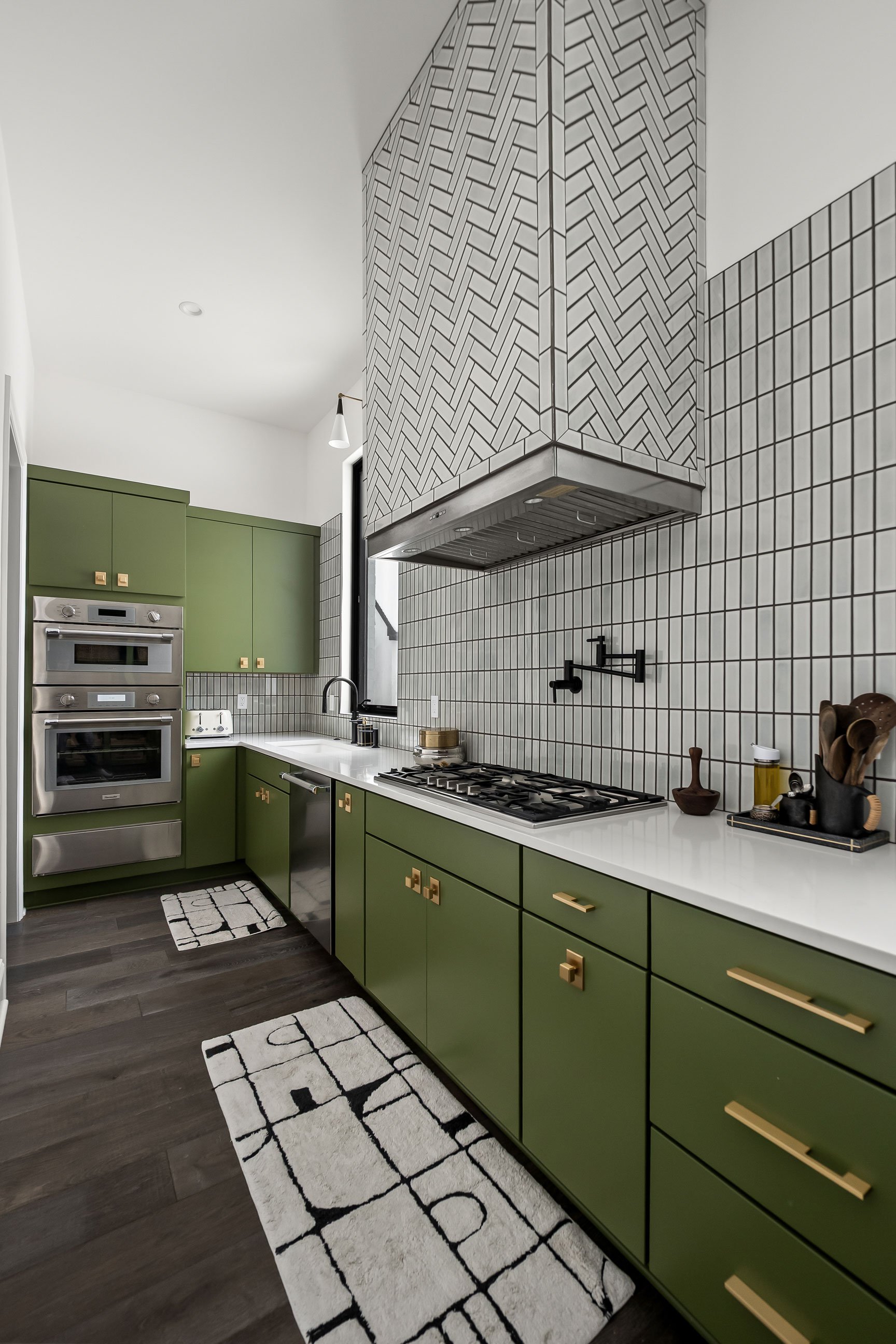 butlet pantry featuring green cabinetry
